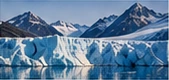 Blue glaciers beneath snow-covered mountains